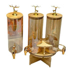 Elegant Triple Section Glass Beverage Dispenser with Gold Deer Lid, Wooden Stand, Round Design, Perfect for Gatherings.