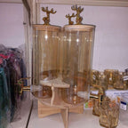 Elegant Triple Section Glass Beverage Dispenser with Gold Deer Lid, Wooden Stand, Round Design, Perfect for Gatherings.